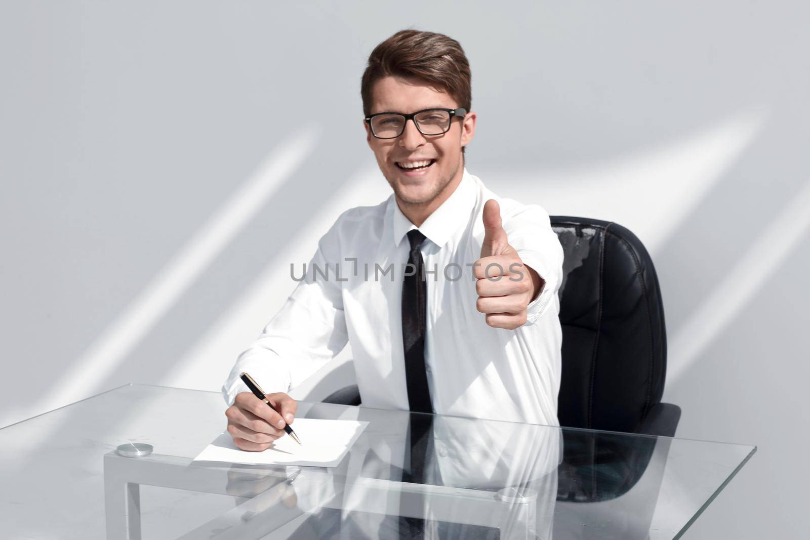 close up.smiling businessman pointing at you.business concept