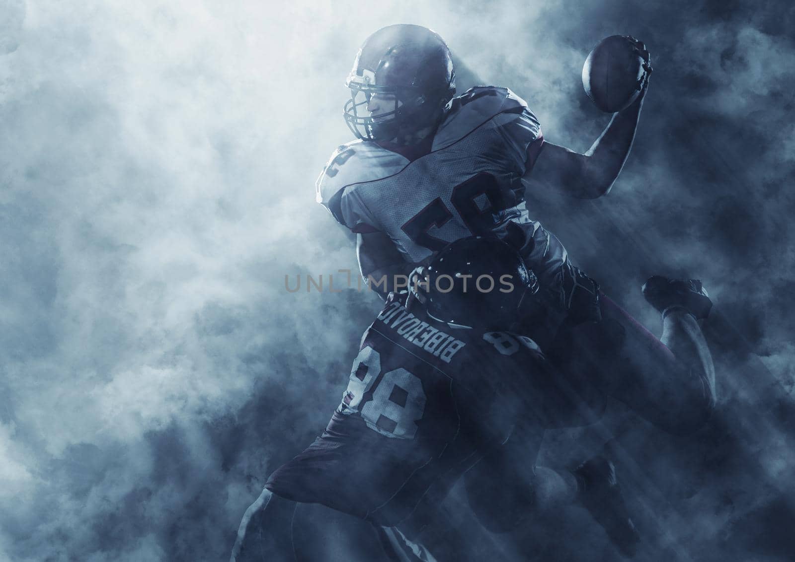 American football players in action by dotshock