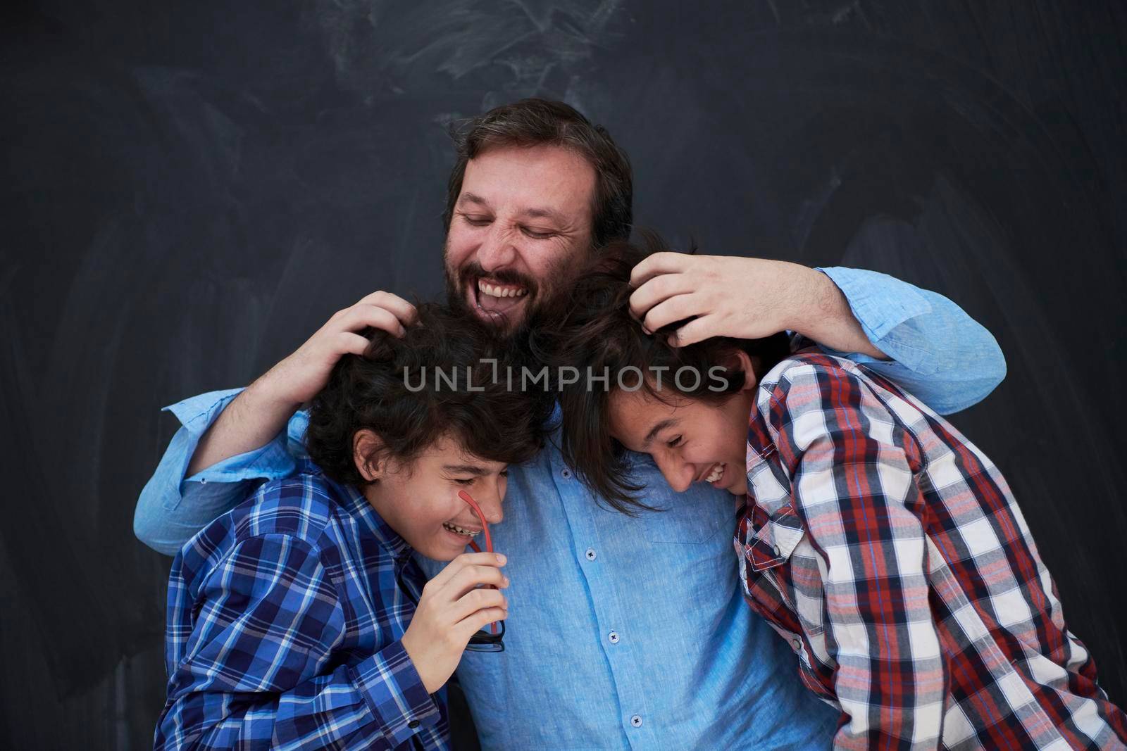 happy father hugging sons unforgetable moments of family joy in mixed race middle eastern arab family