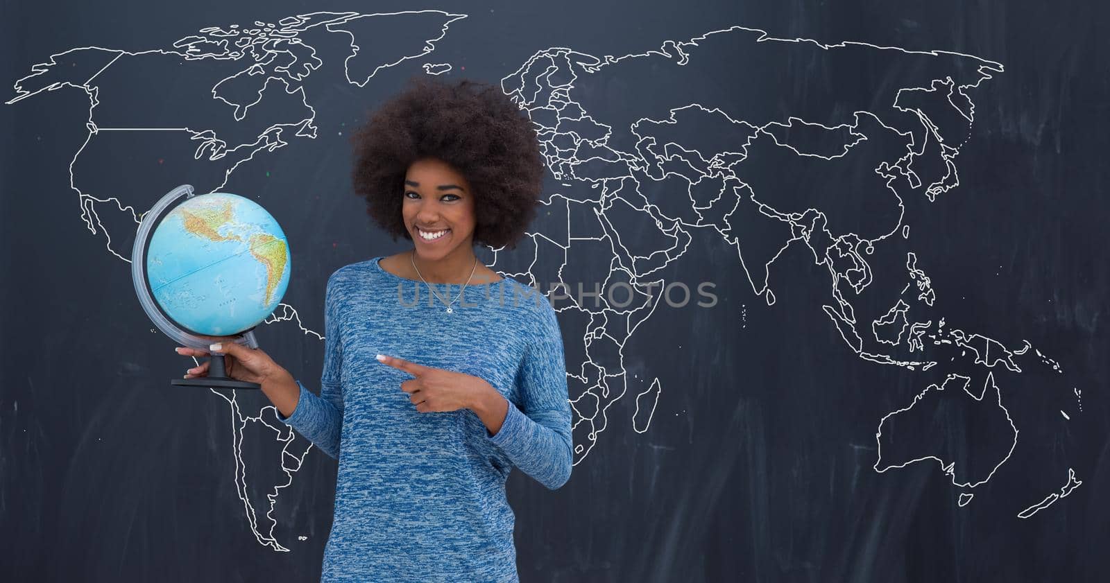 black woman holding Globe of the world by dotshock