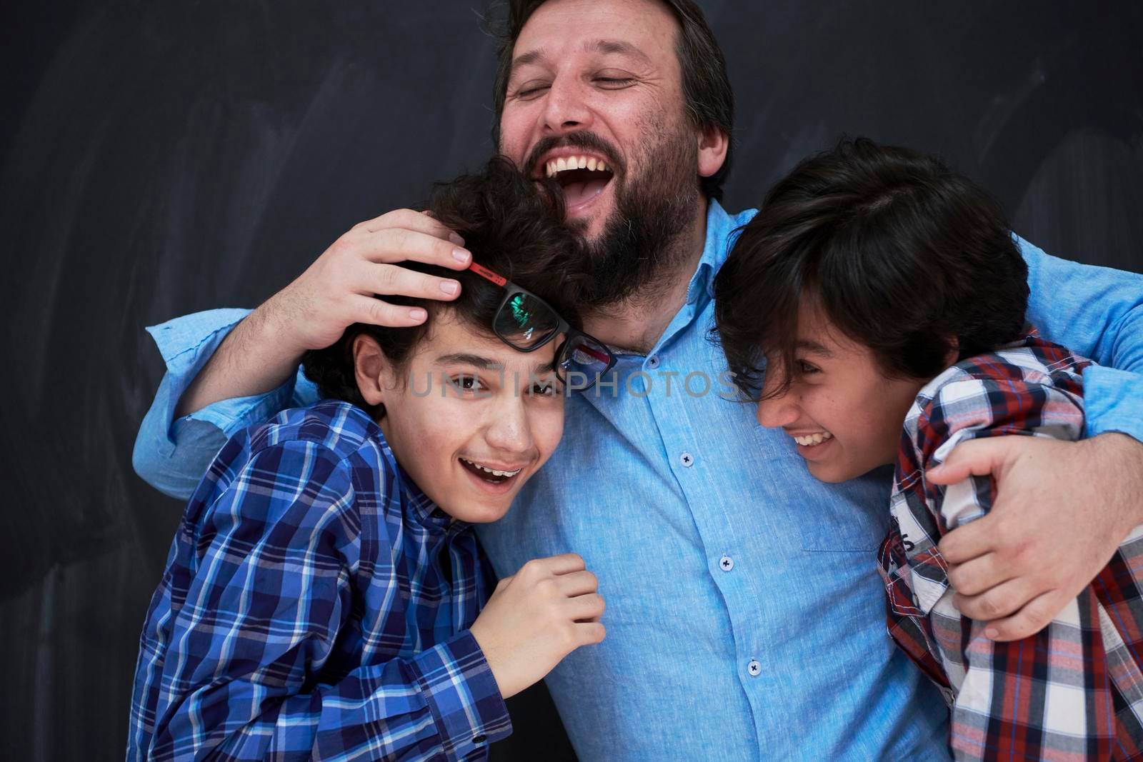 happy father hugging sons unforgetable moments of family joy in mixed race middle eastern arab family