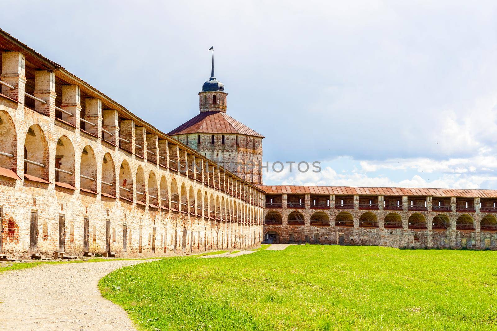 High, brick, vaulted walls of old brick in the old Russian monastery. Concept history of Russia, tourism.