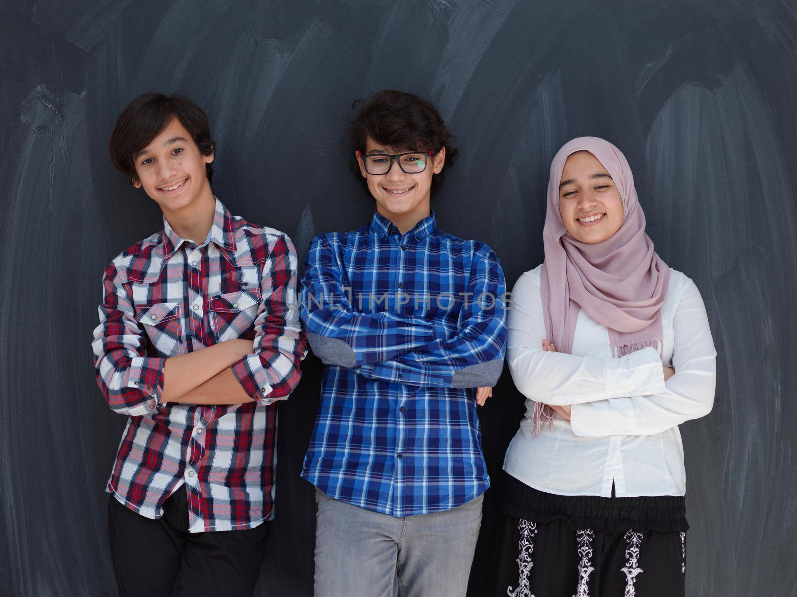 teens portrait arab family , ,iddle eastern students team against black chalkboard