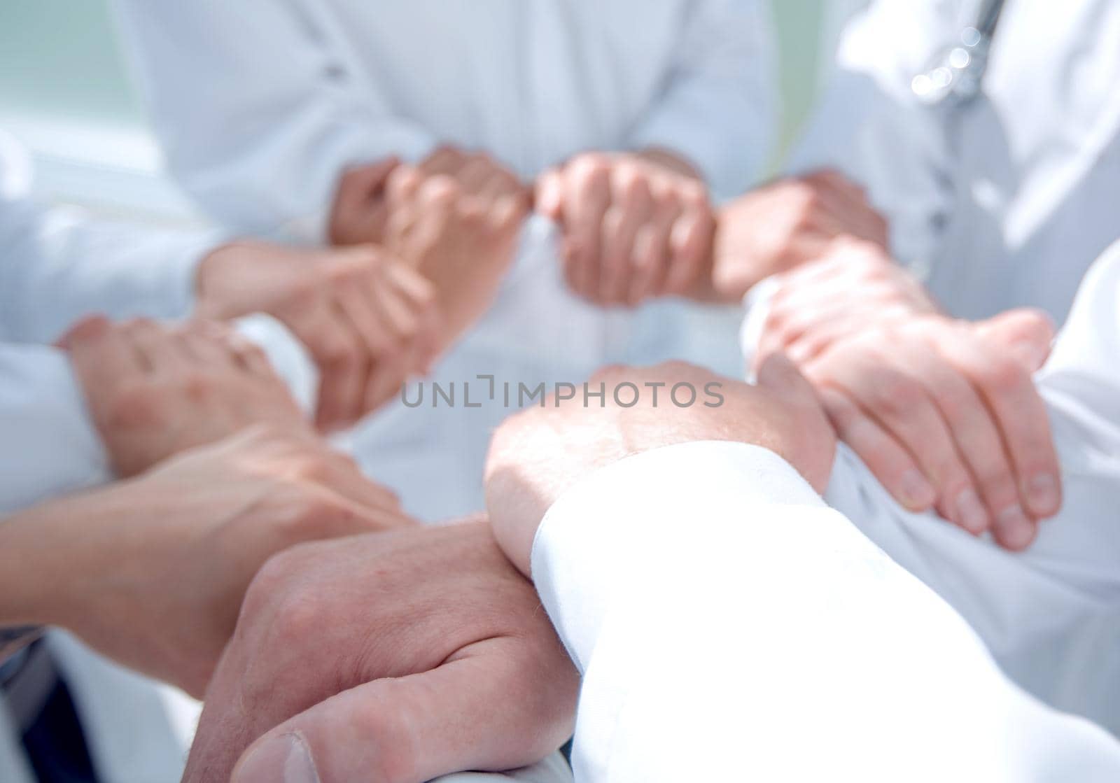 close up.background image of doctors standing together. the concept of teamwork