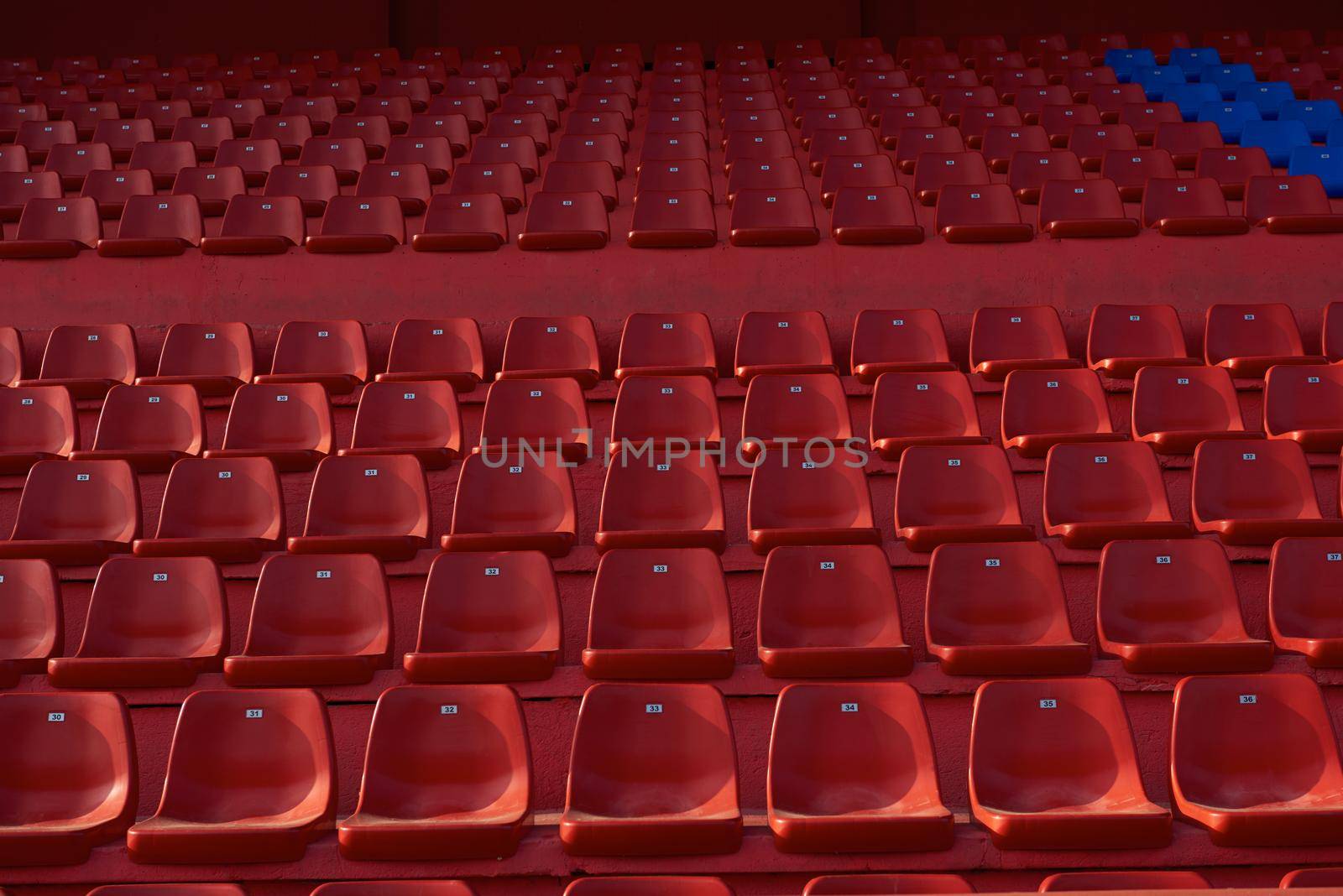 stadium red chairs by dotshock