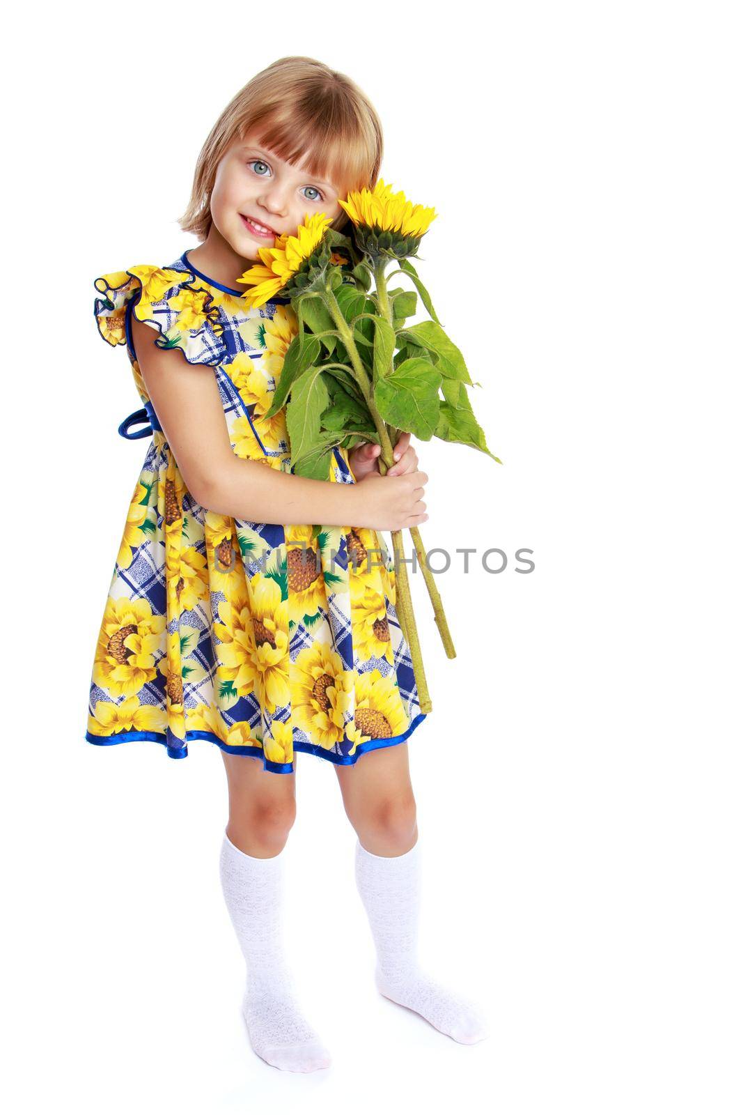 Little girl with a beautiful bouquet of flowers. The concept of holidays, family and children. Isolated on white background.