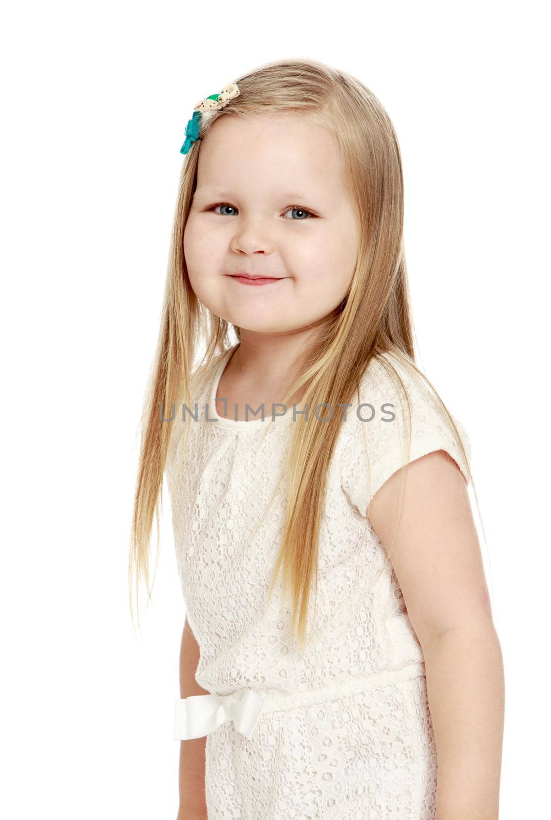 Close-up .Adorable little round-faced girl with long, blonde hair below the shoulders, little Princess - Isolated on white background