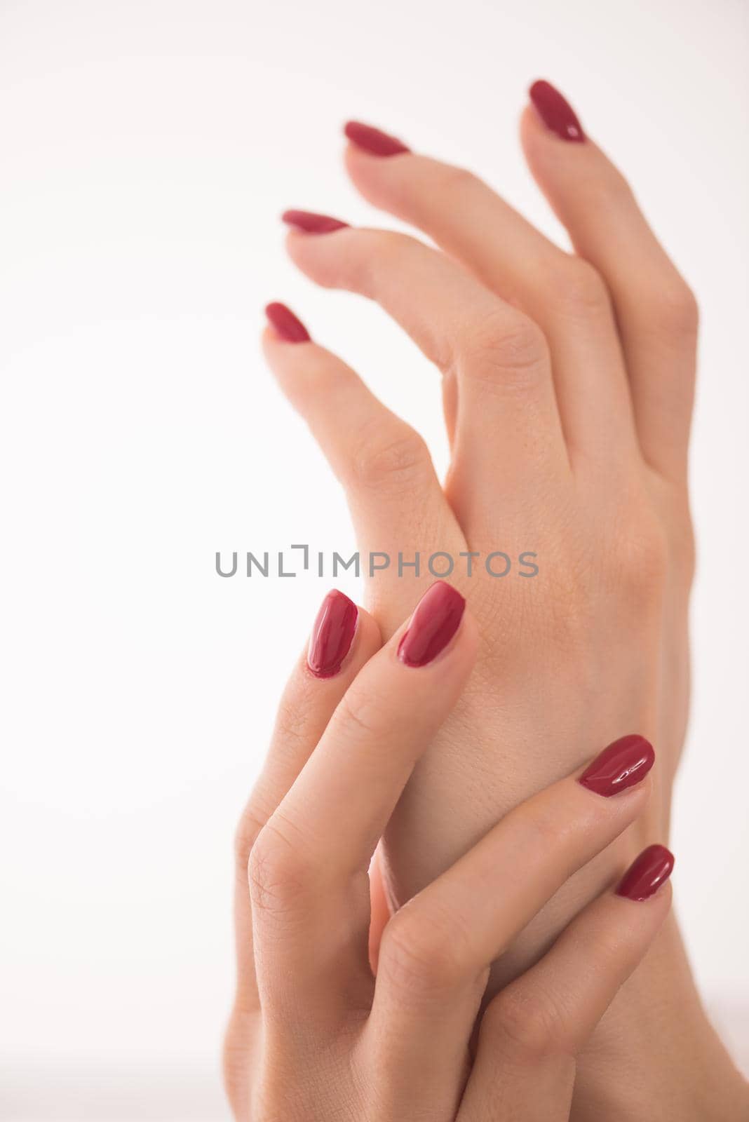 closeup of hands of a young woman by dotshock