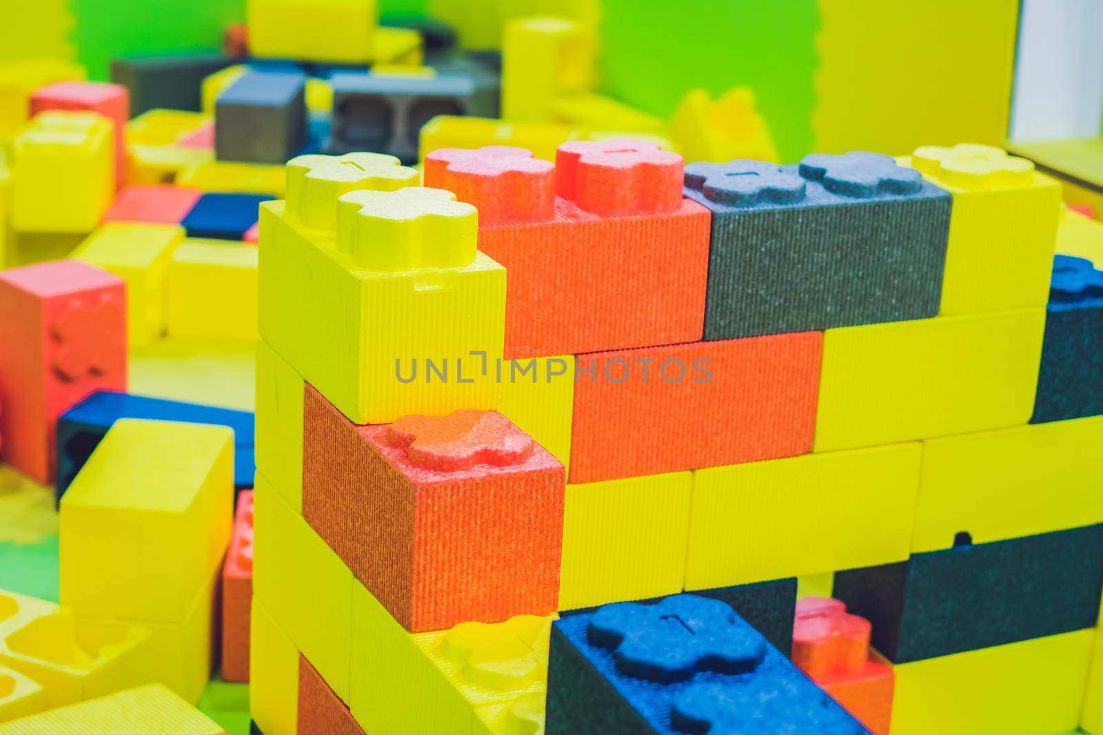 Kids toy house made of colorful blocks.