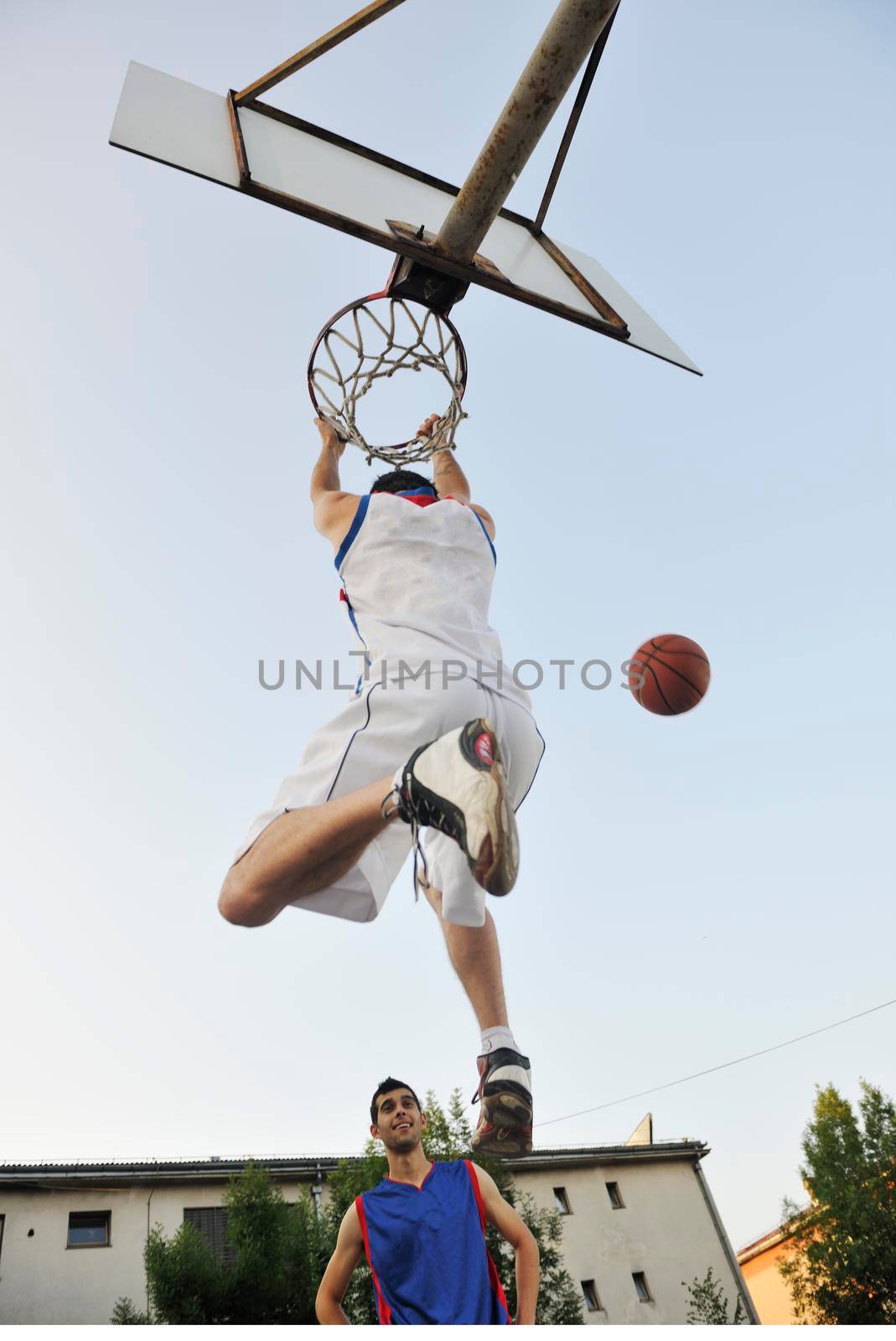 basketball player practicing and posing for basketball and sports athlete concept