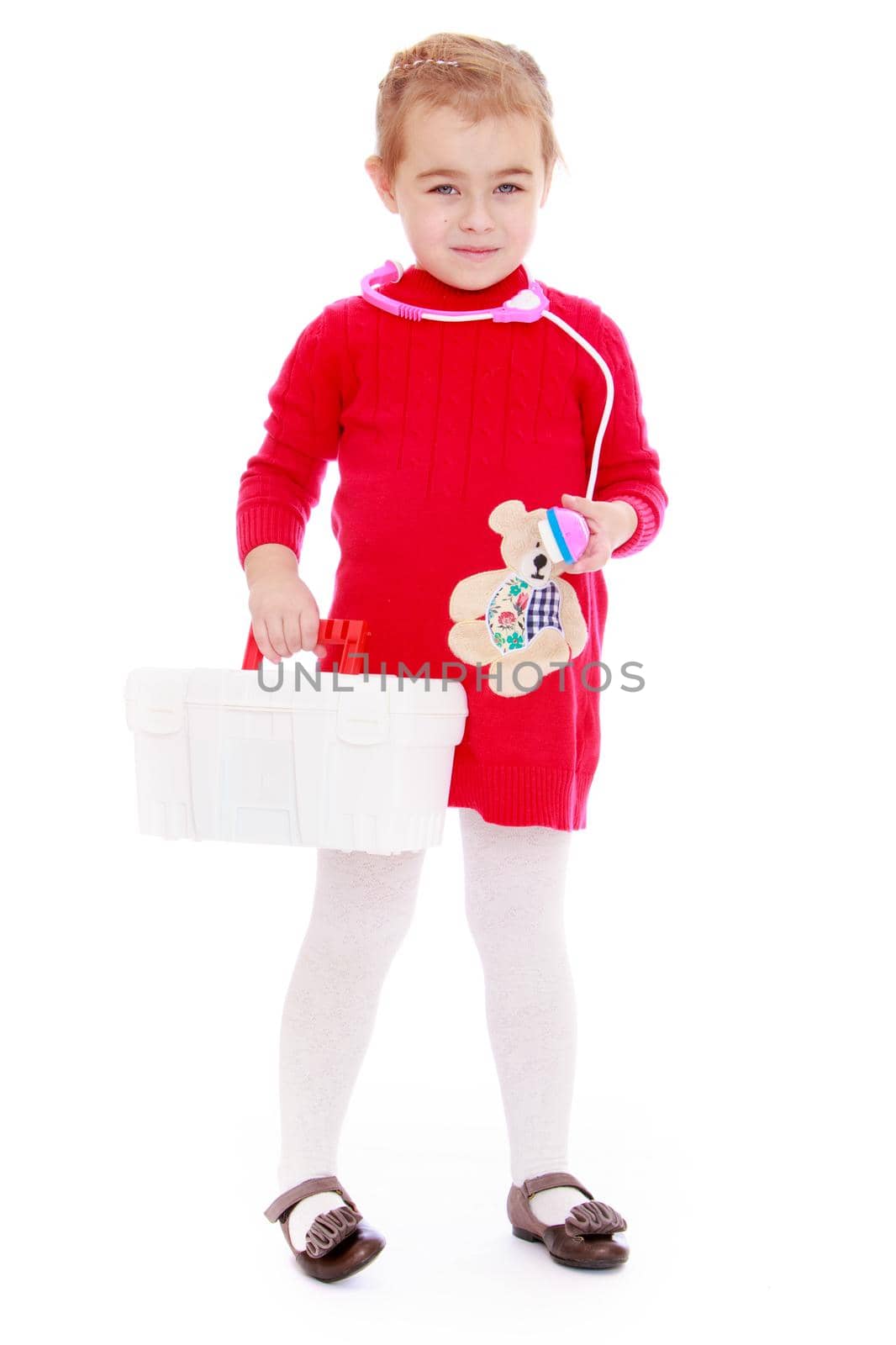 Nice little girl in red dress is holding a white briefcase- Isolated on white background