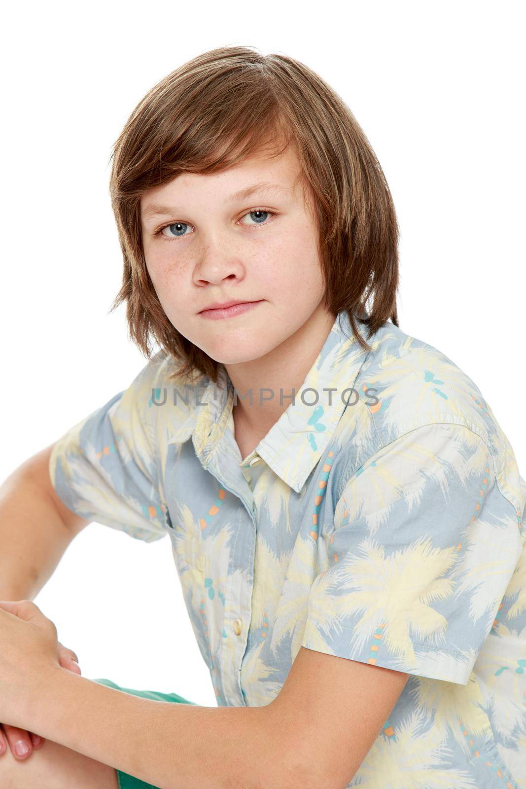 Teen with long hair in a shirt with short sleeves. Close-up - Isolated on white background