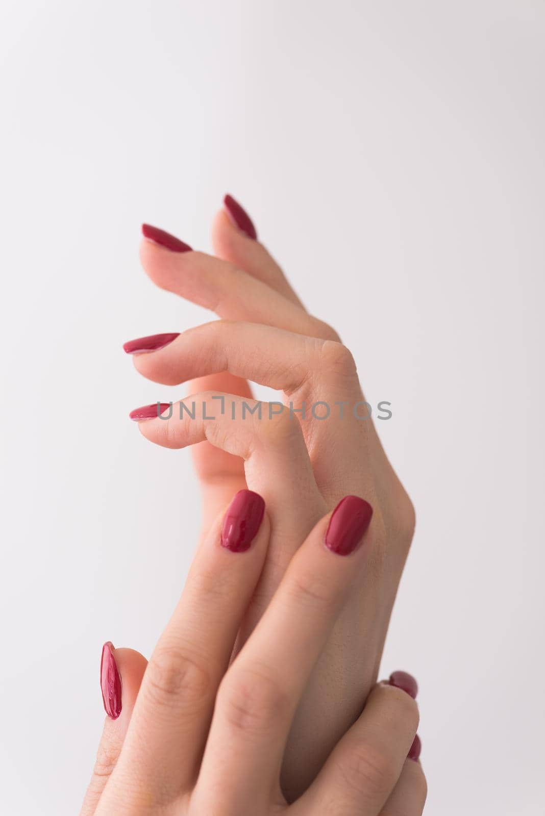 closeup of hands of a young woman by dotshock