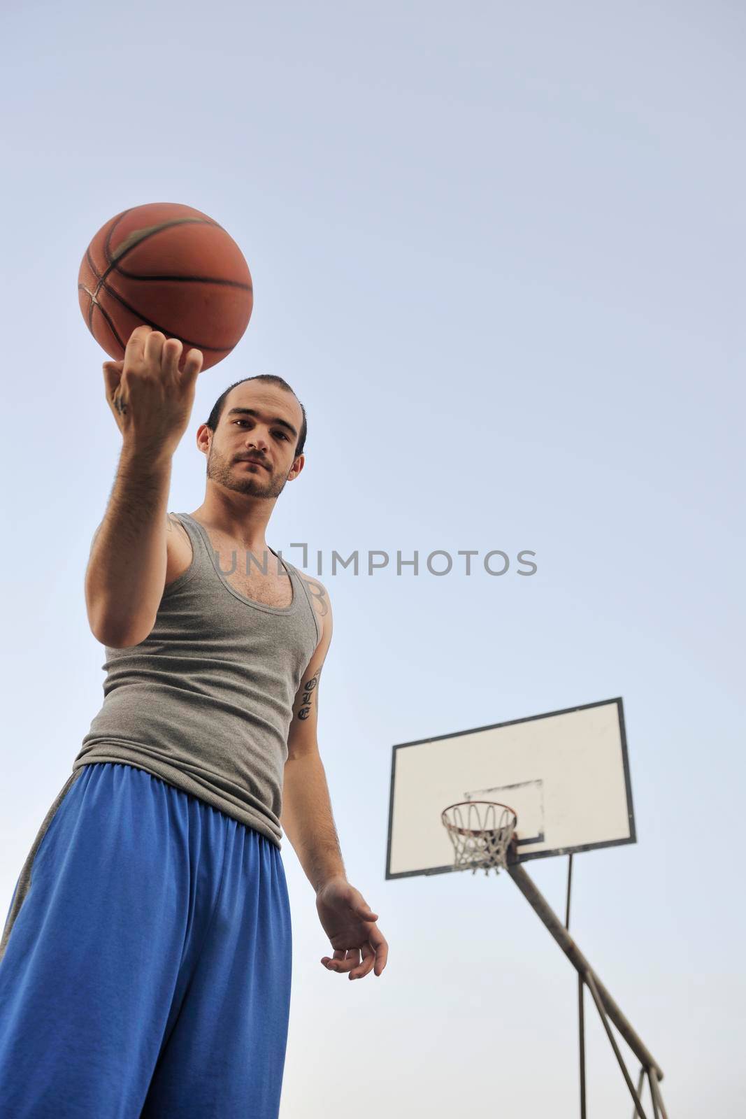 basketball player practicing and posing for basketball and sports athlete concept