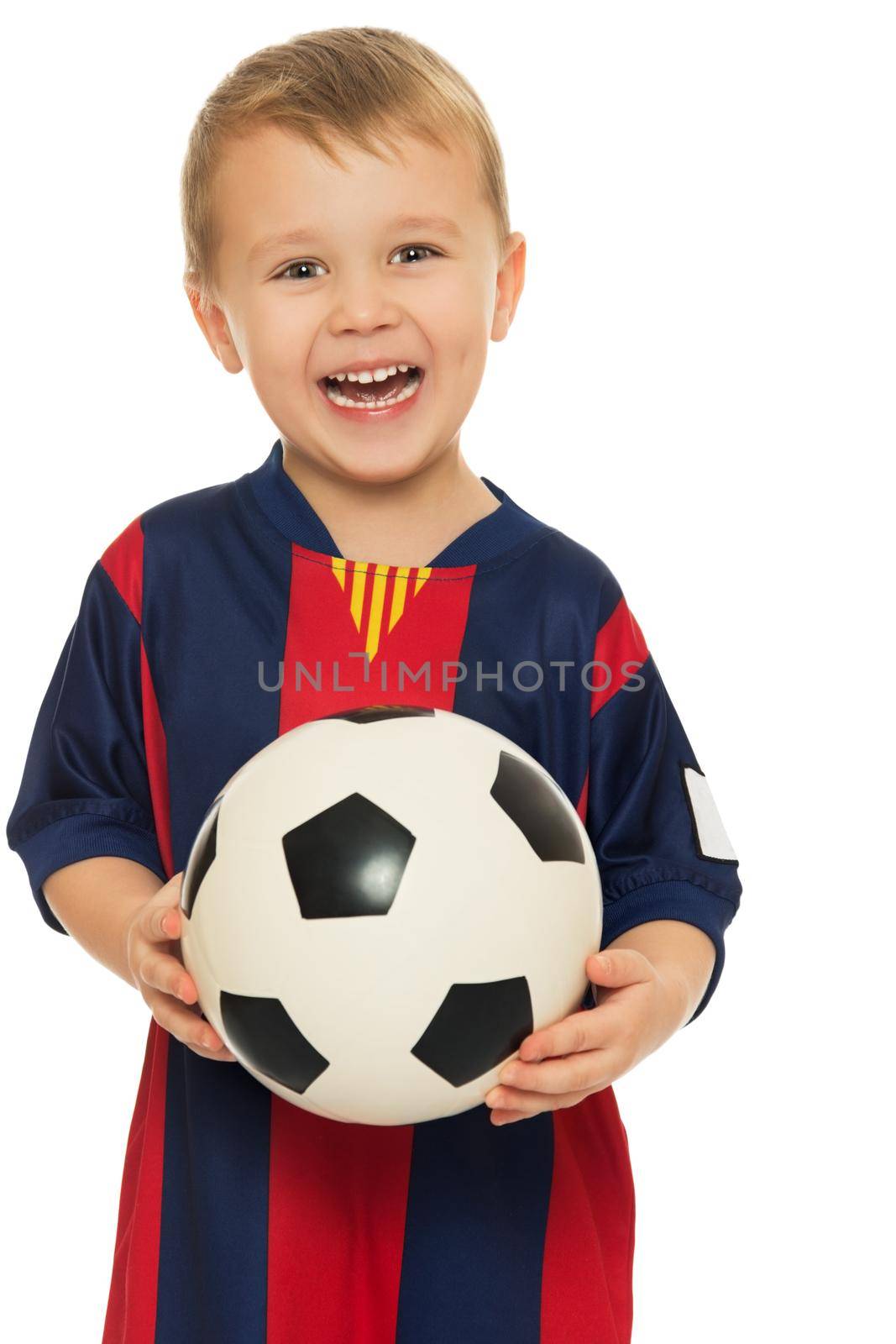 Portrait of a cheerful little boy football player in a striped uniform. The boy holds a hand soccer ball. Close-up - Isolated on white background