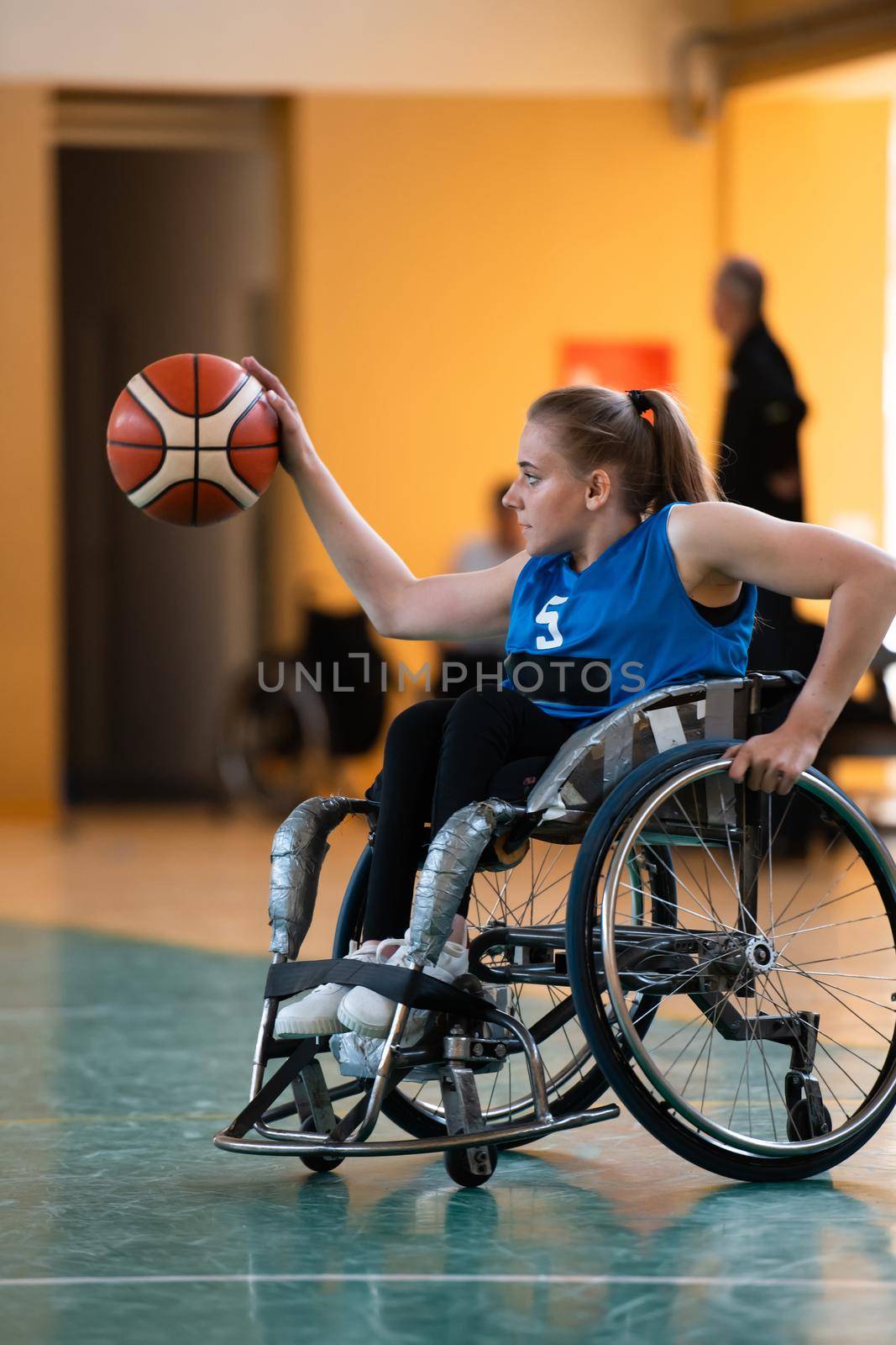  photo of the basketball team of war invalids with professional sports equipment for people with disabilities on the basketball court. High quality photo