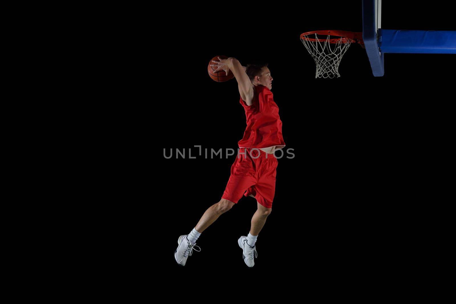 basketball game sport player in action isolated on black background