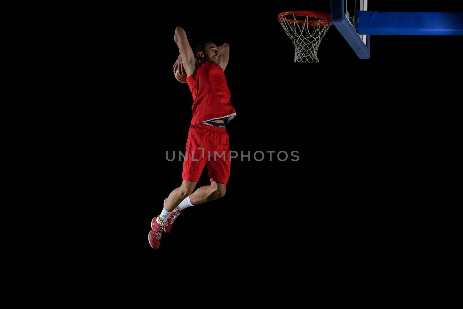 basketball game sport player in action isolated on black background