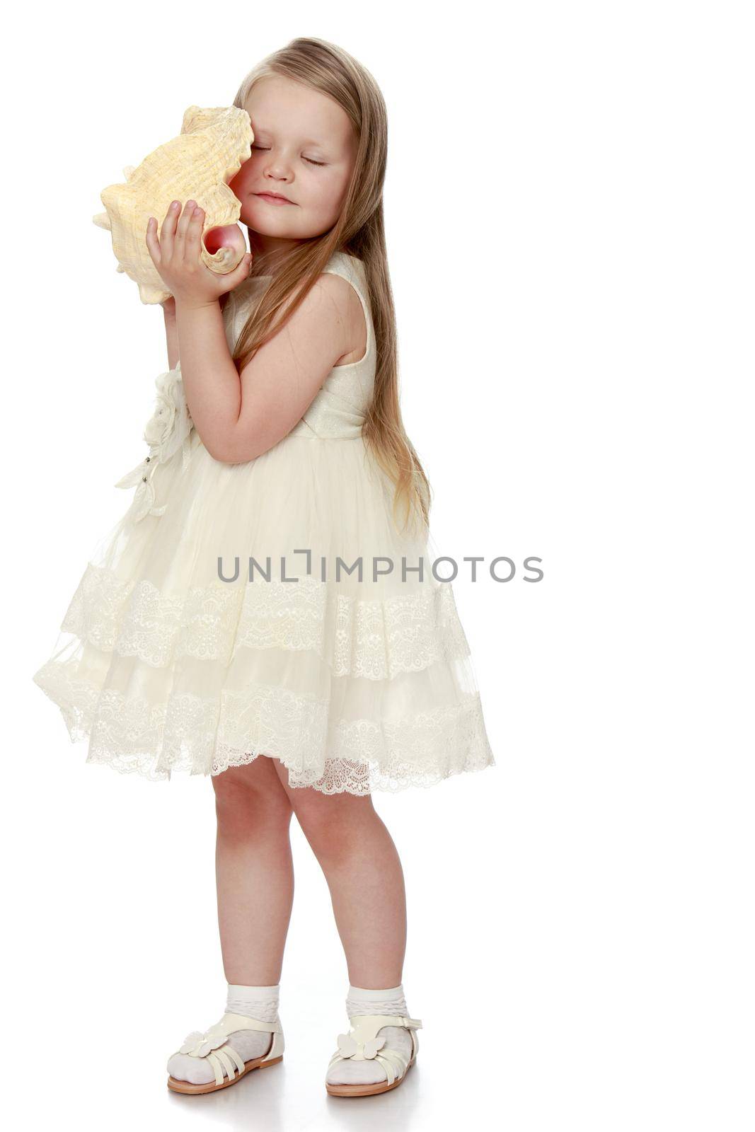 Little girl in white dress by kolesnikov_studio