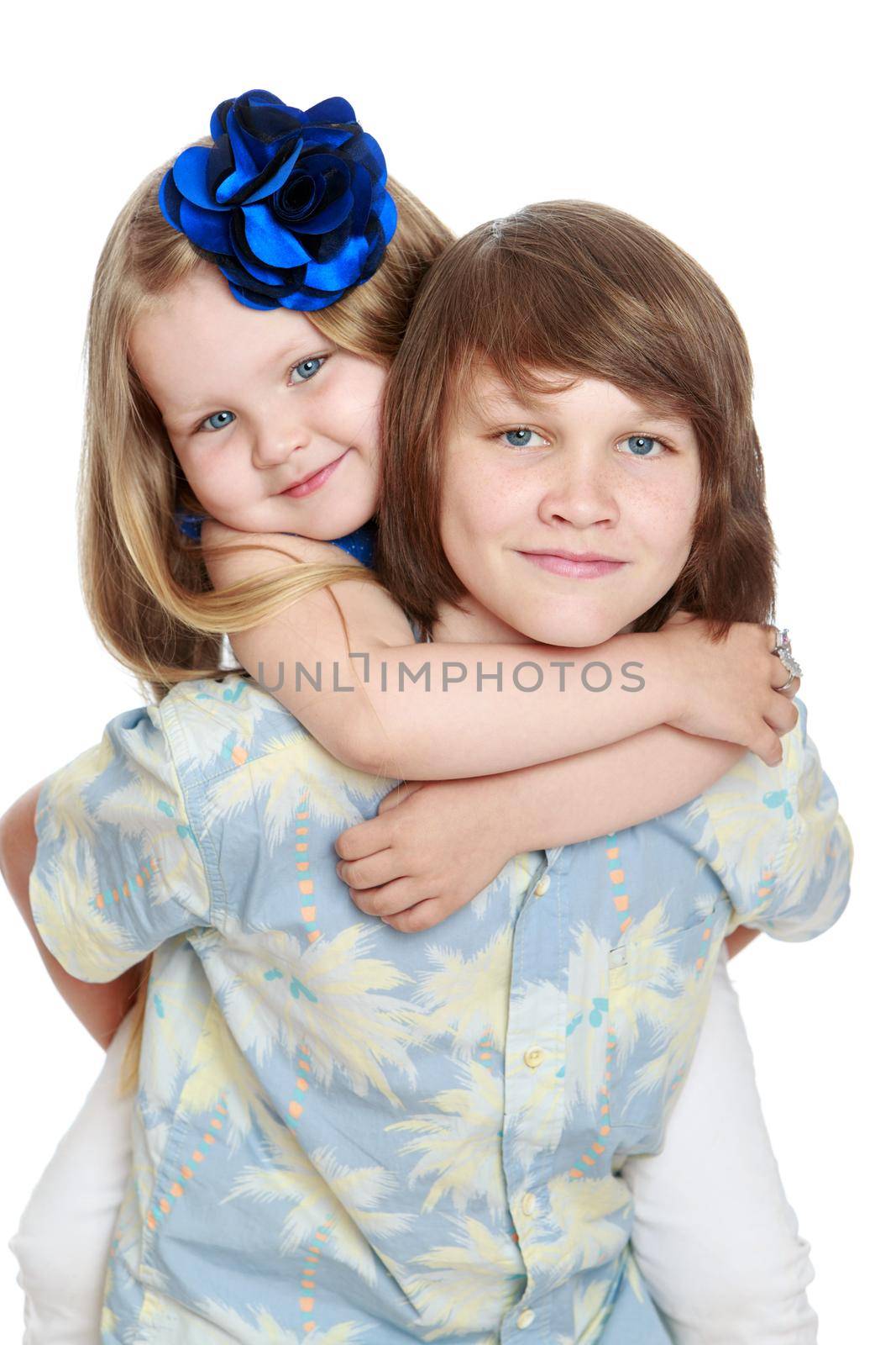 Brother and sister hugging by kolesnikov_studio