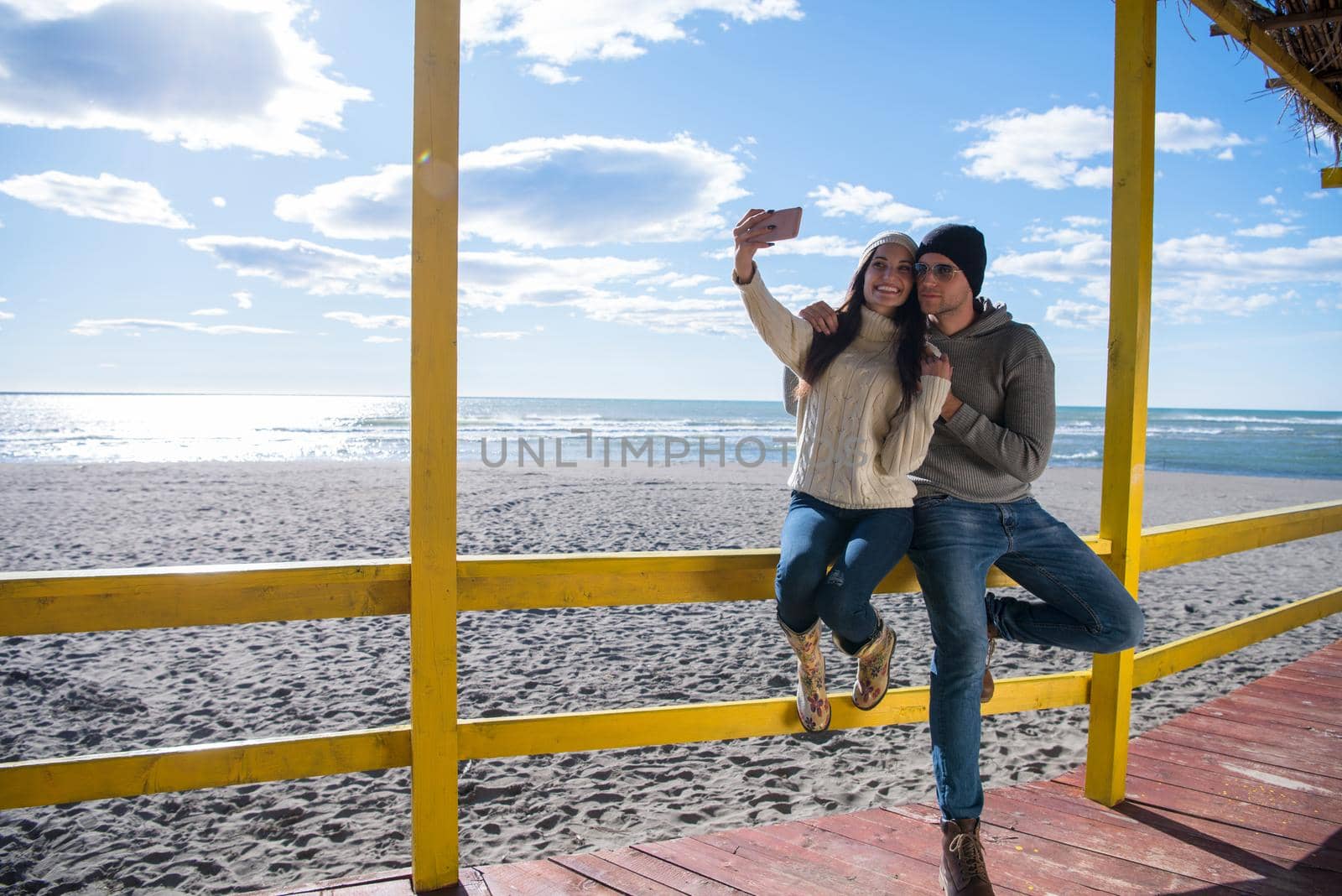Gorgeous couple taking Selfie picture by dotshock