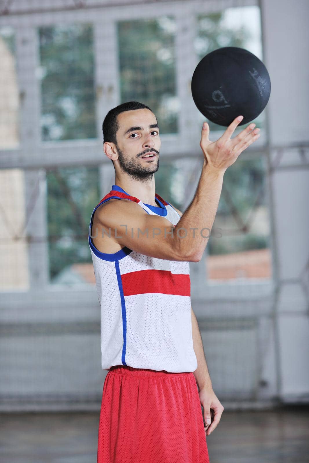 young and healthy people man have recreation and training exercise  while play basketball game at sport gym indoor hall