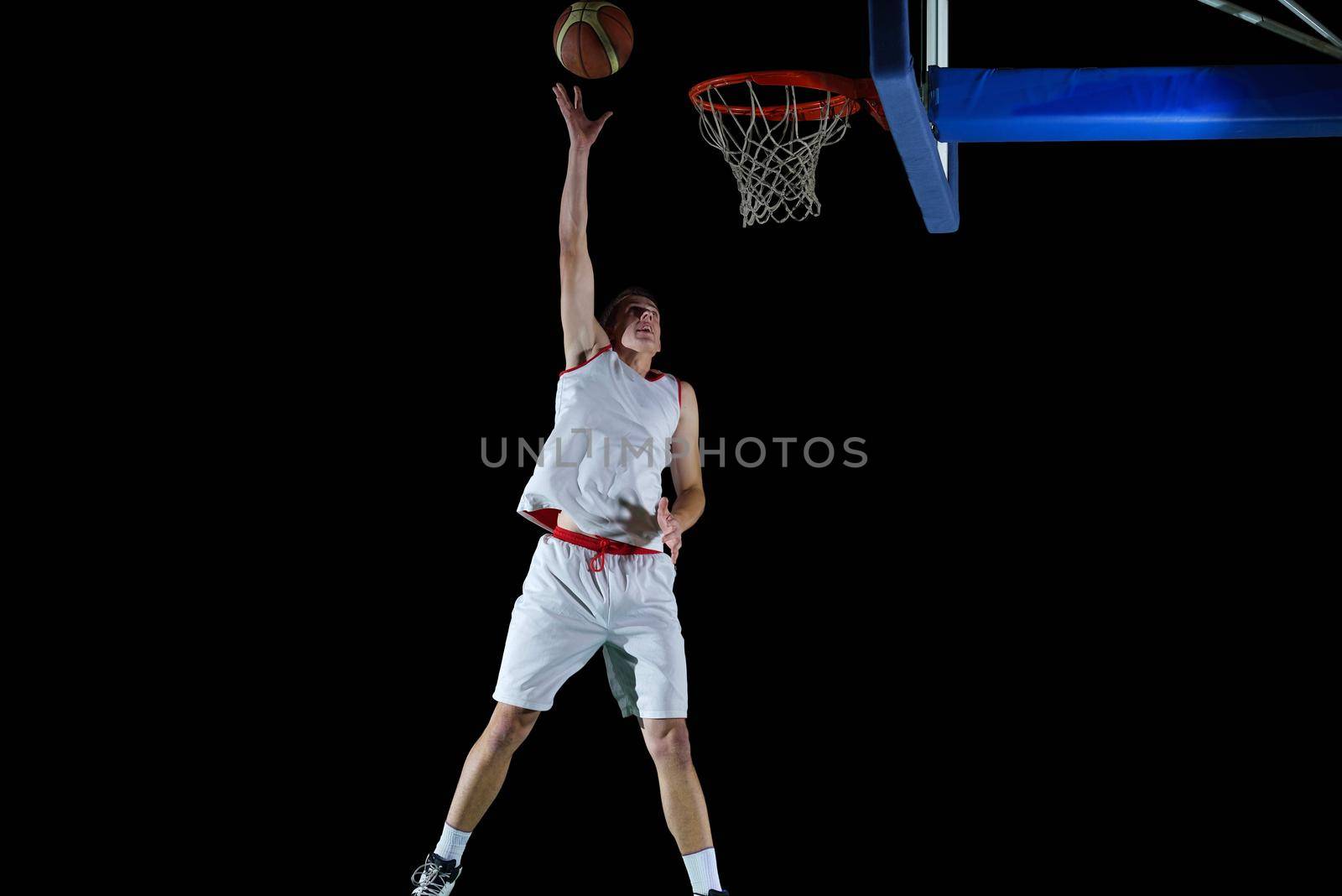 basketball game sport player in action isolated on black background