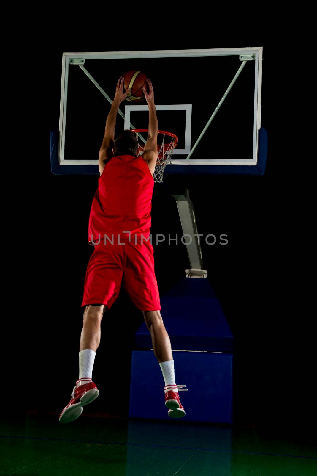 basketball game sport player in action isolated on black background