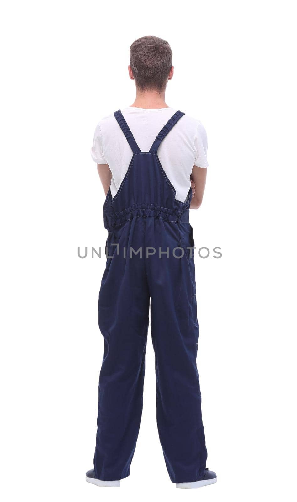 rear view.young man in blue overalls. by asdf