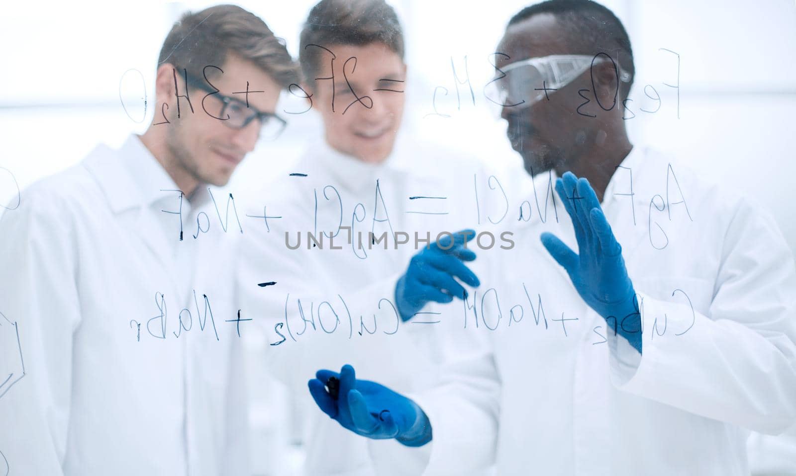 group of scientists discuss the results.concept of education