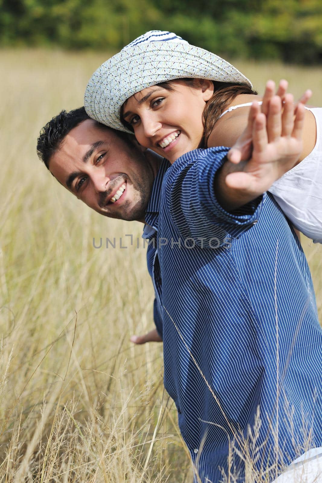 happy young couple have romantic time outdoor by dotshock