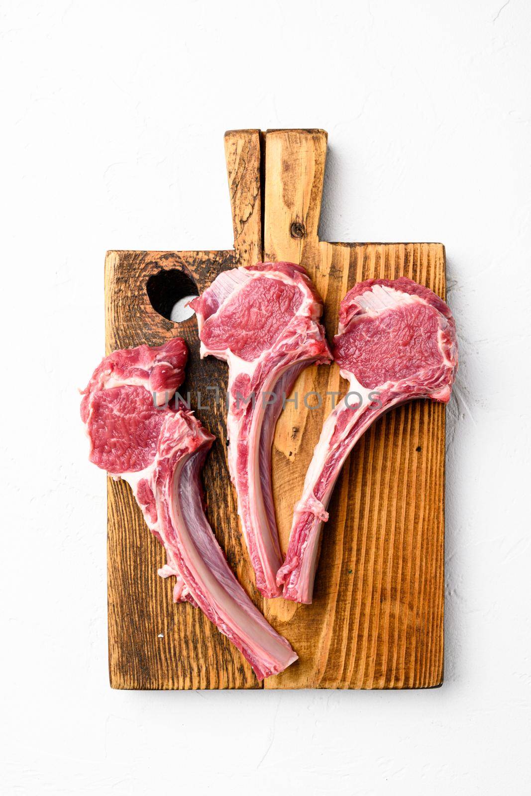 Lamb chops or mutton cuts set, on white stone table background, top view flat lay