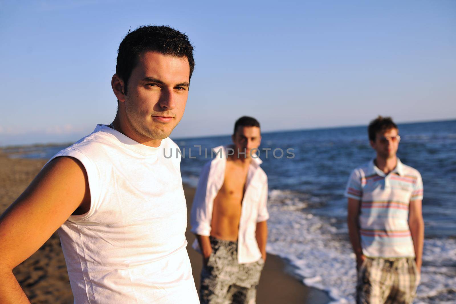 young man have good time and relax at beautifu beach at seaside