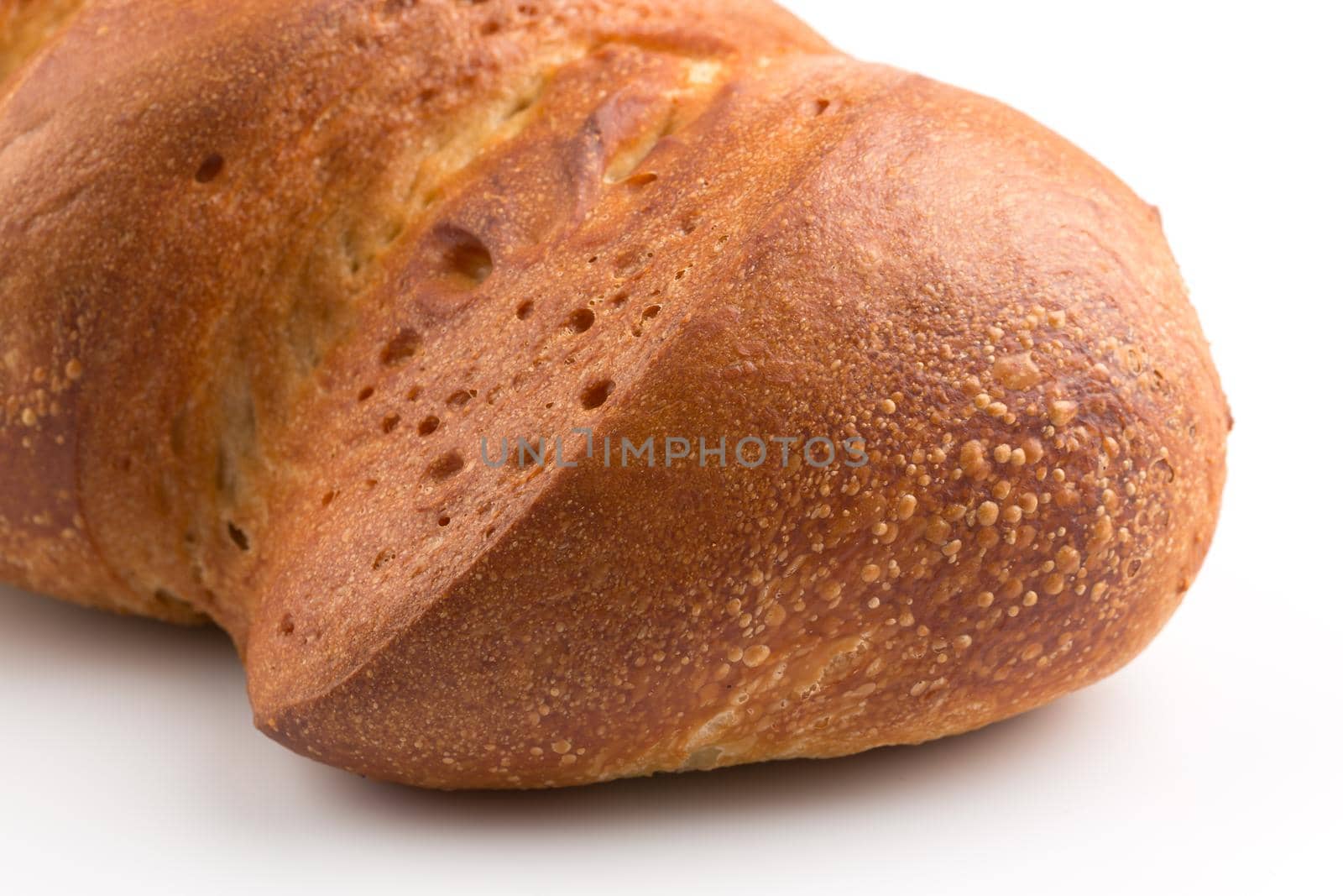 Fresh baked traditional bread on a white background
