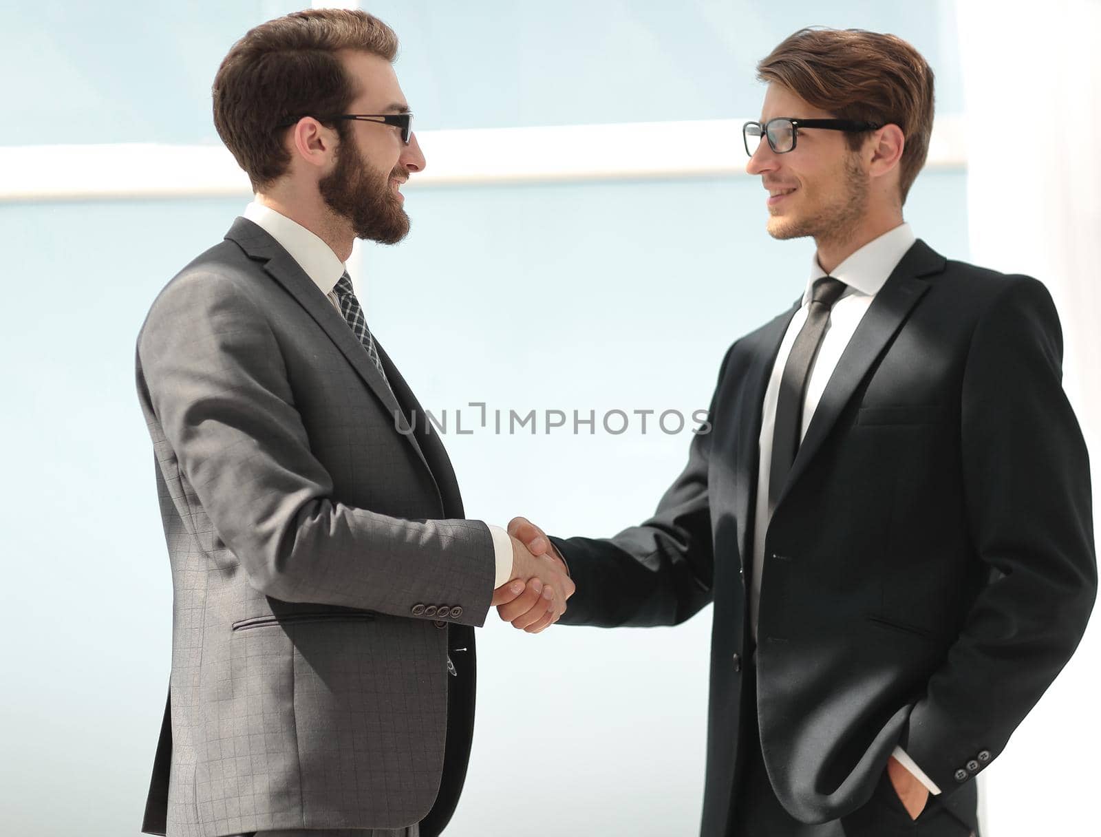 two business people shaking hands .photo with copy space