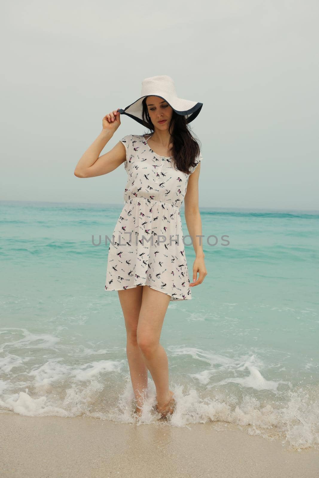 Happy Beautiful Woman Enjoying Summer Vacation on beach