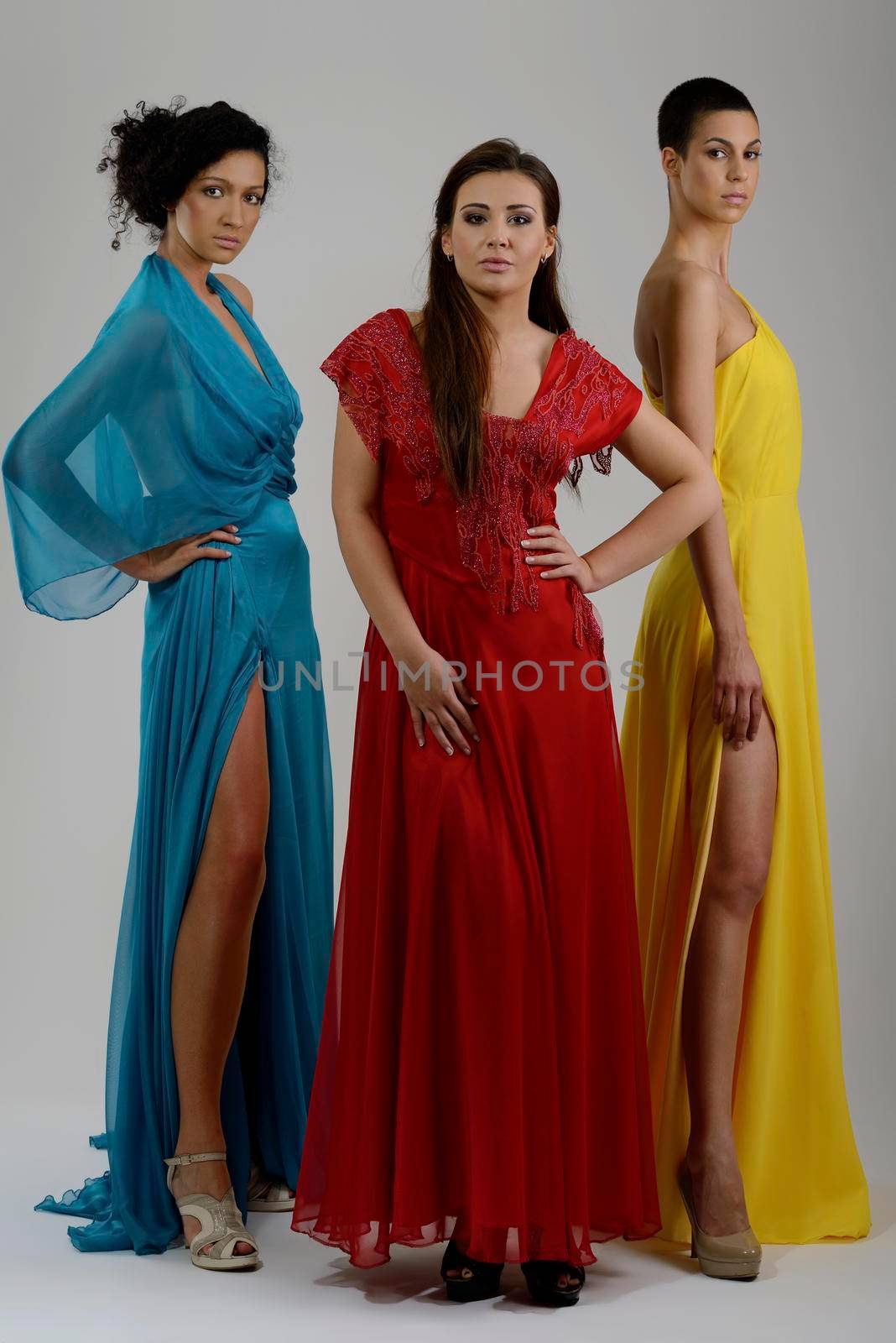 portrait of a three beautiful woman in wedding dress by dotshock