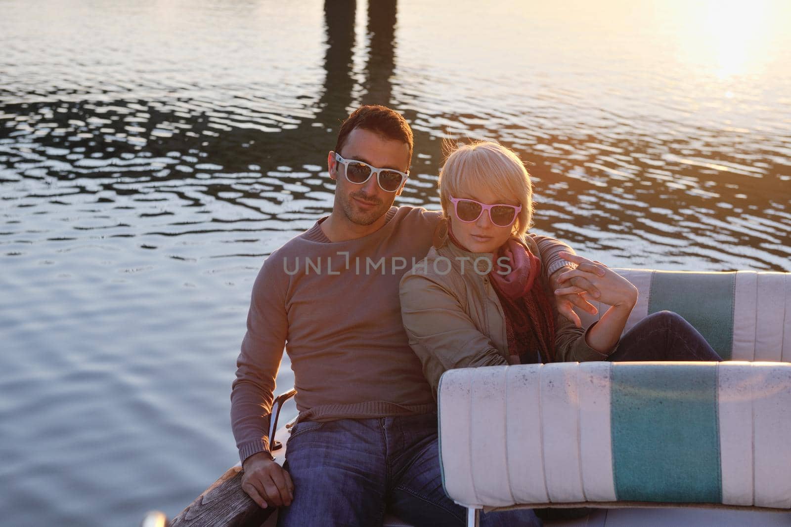 couple in love  have romantic time on boat by dotshock