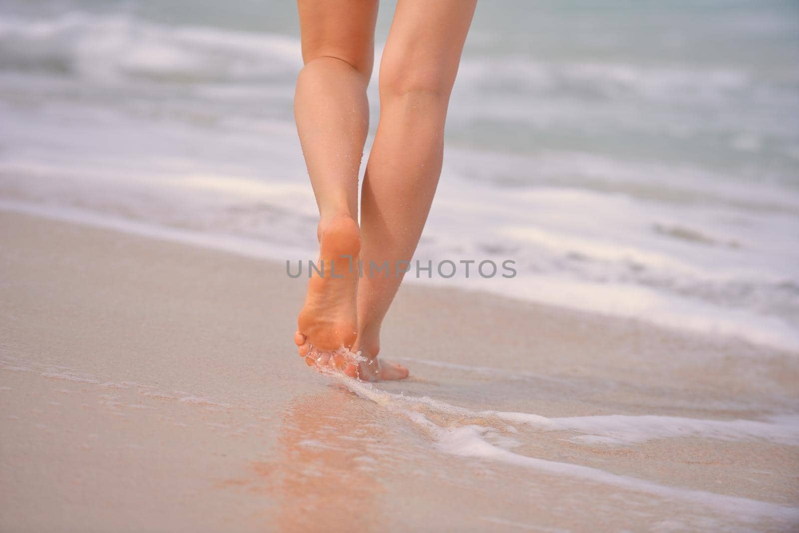 Happy Beautiful Woman Enjoying Summer Vacation on beach