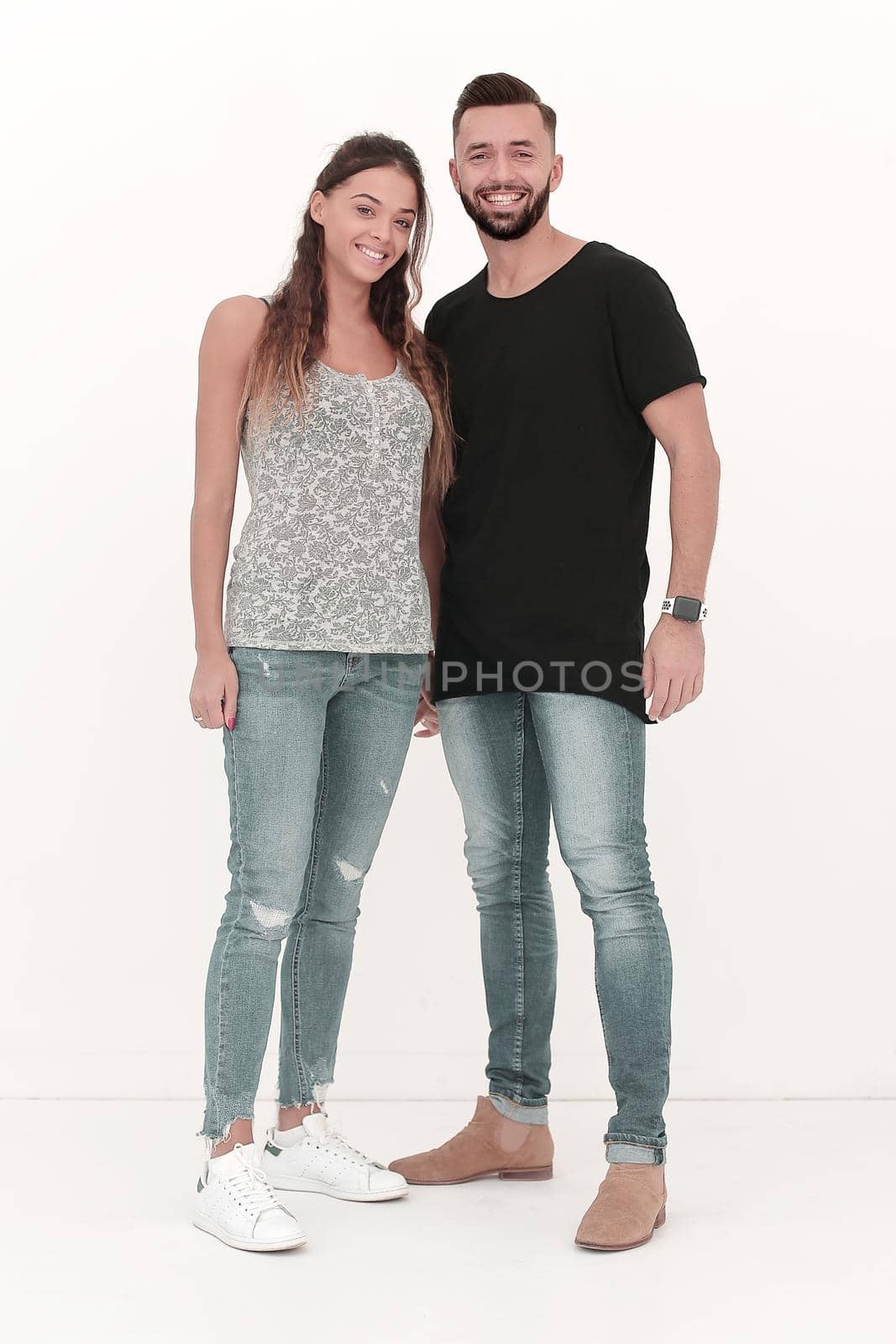 in full growth.beautiful young couple.isolated on white background