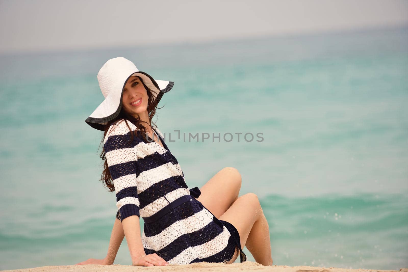 beautifel and happy woman girl on beach have fun and relax on summer vacation  over the beautiful tropical sea