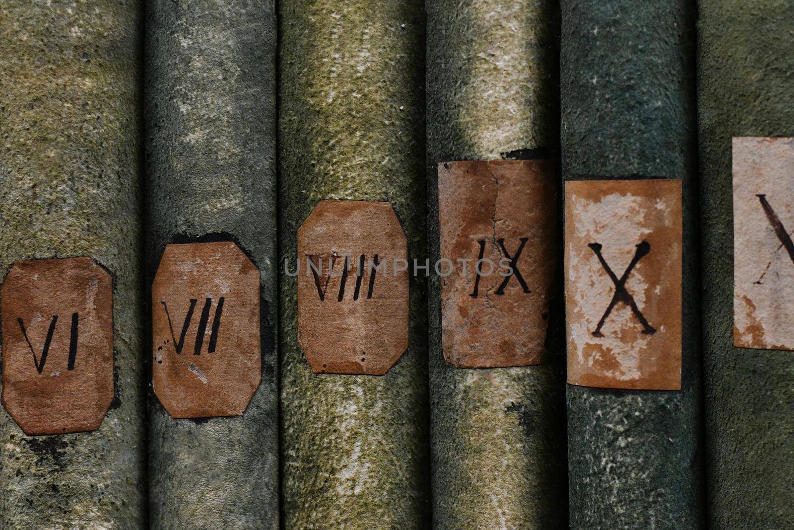 Old books with Roman numerals in the library archive