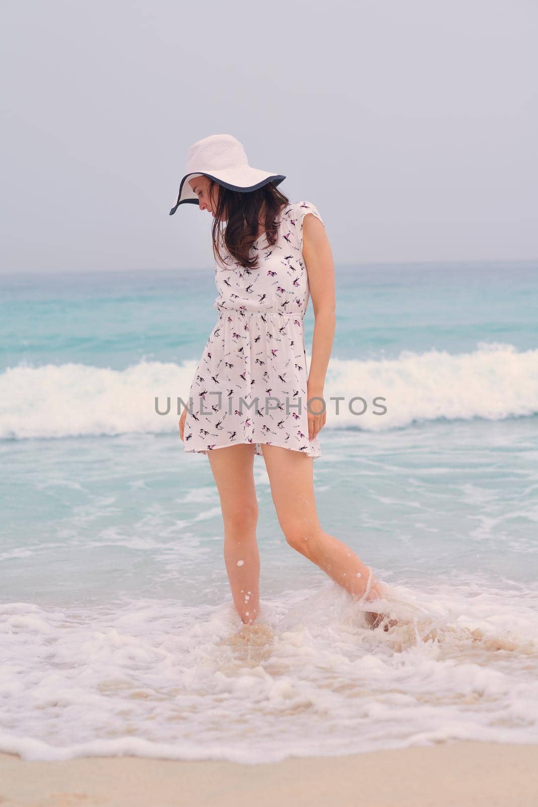 Happy Beautiful Woman Enjoying Summer Vacation on beach