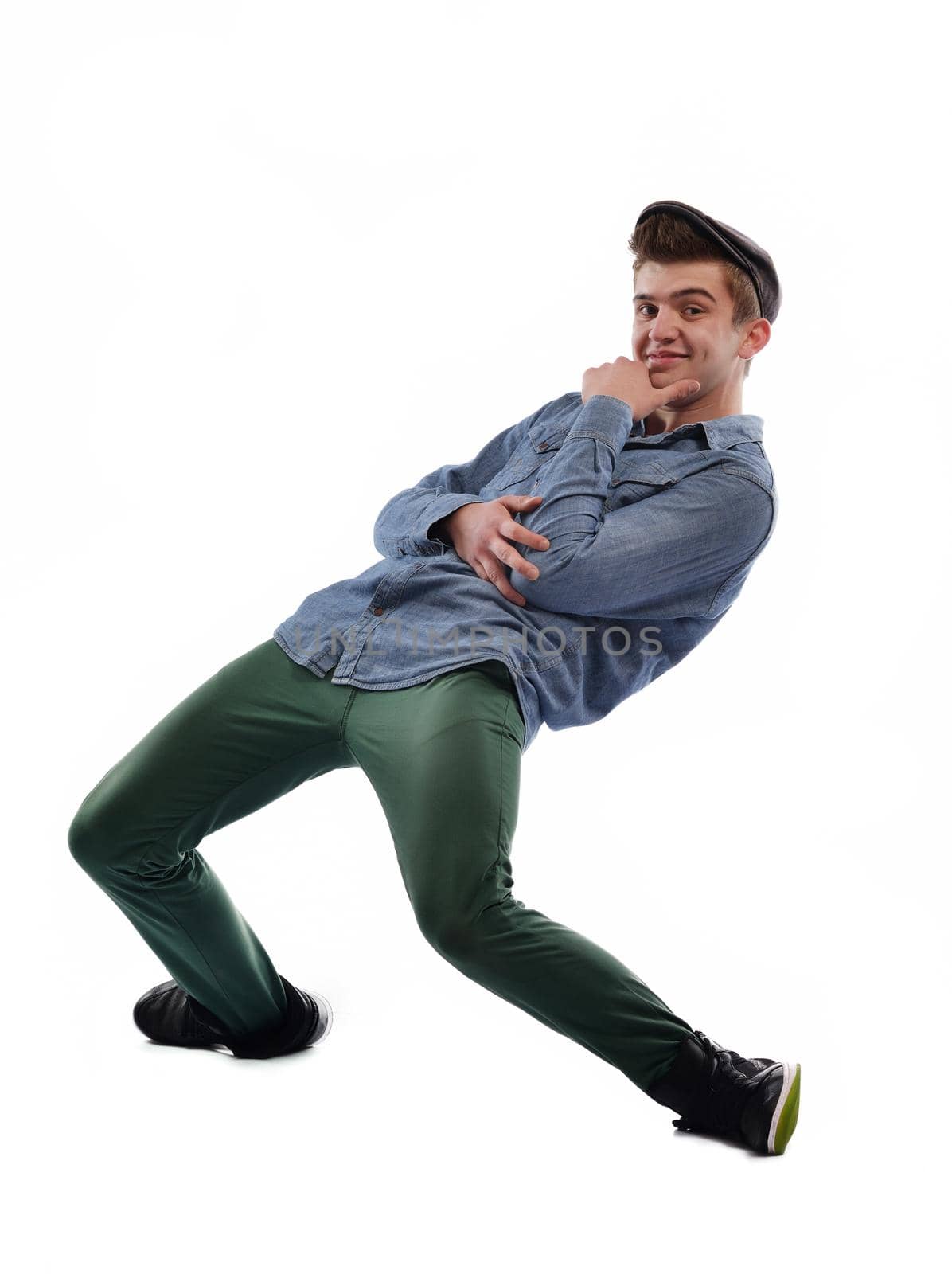 young boy man teen dancing and jumping isolated on white background in studio