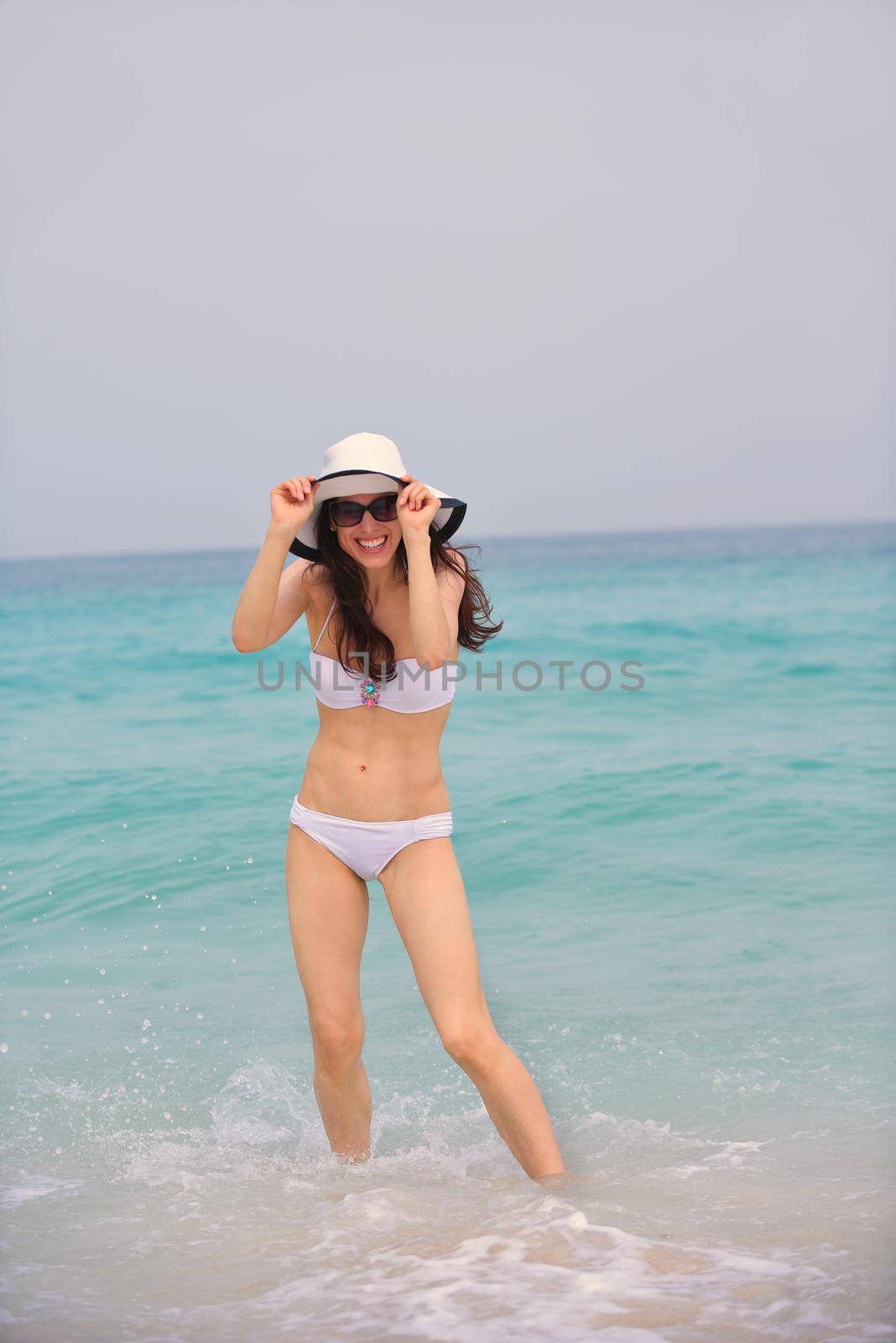 happy woman enjoy summer vacation by dotshock