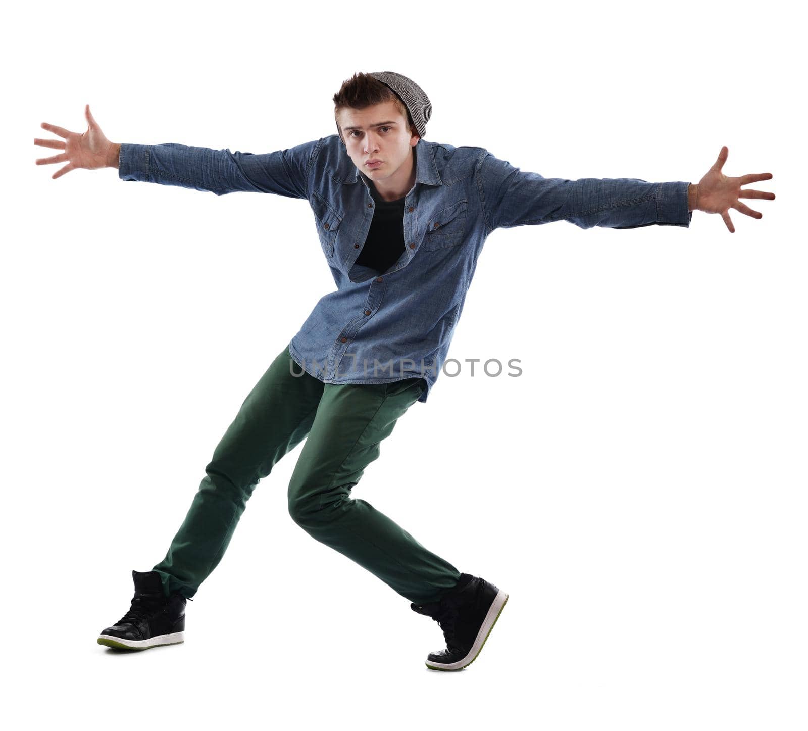 young boy man teen dancing and jumping isolated on white background in studio