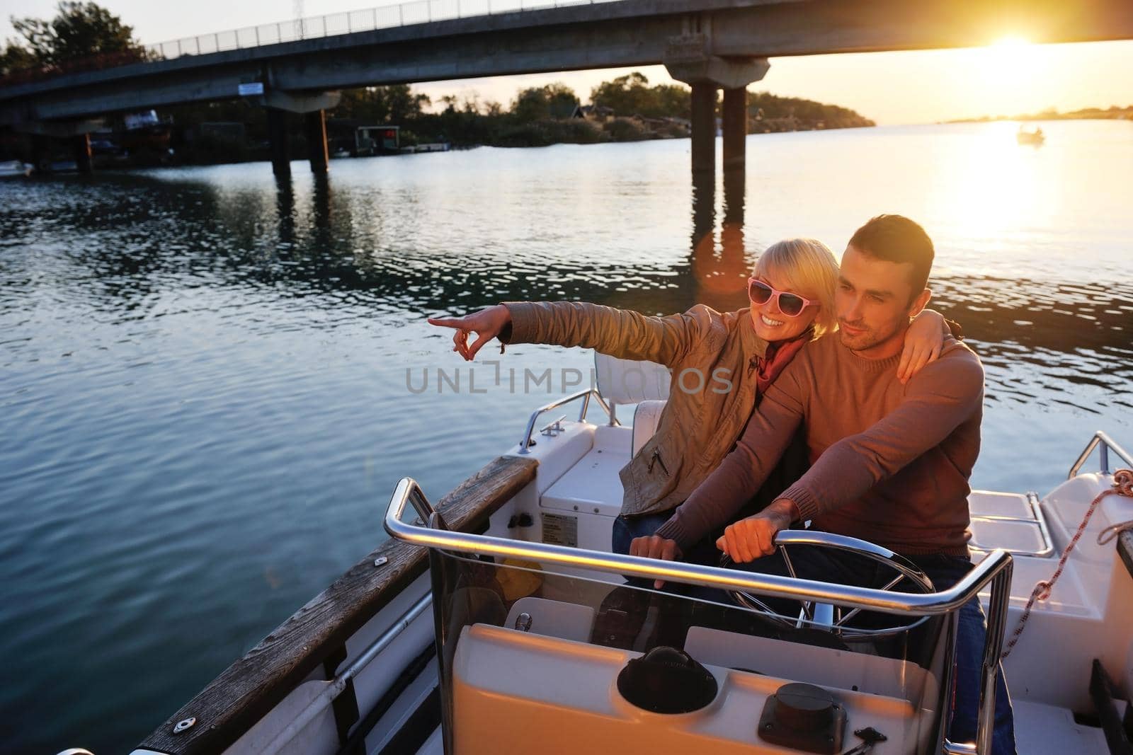 couple in love  have romantic time on boat by dotshock