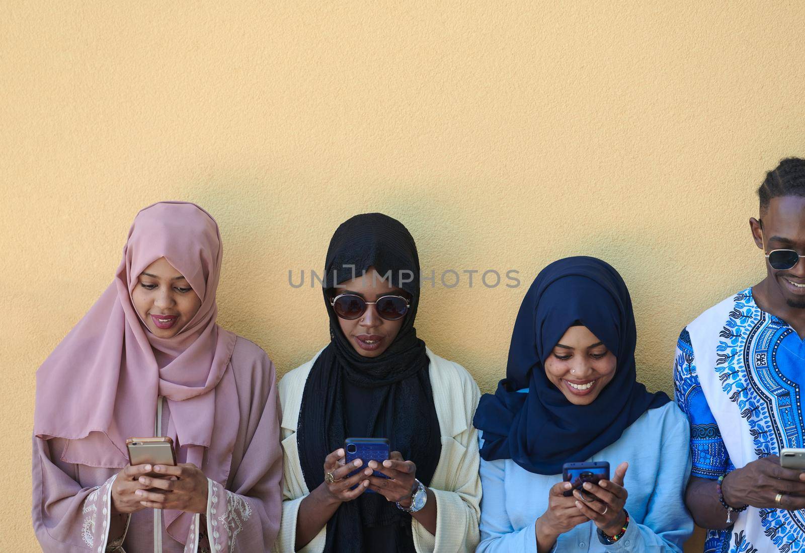 multiethnic startup business people group using smart phones by dotshock