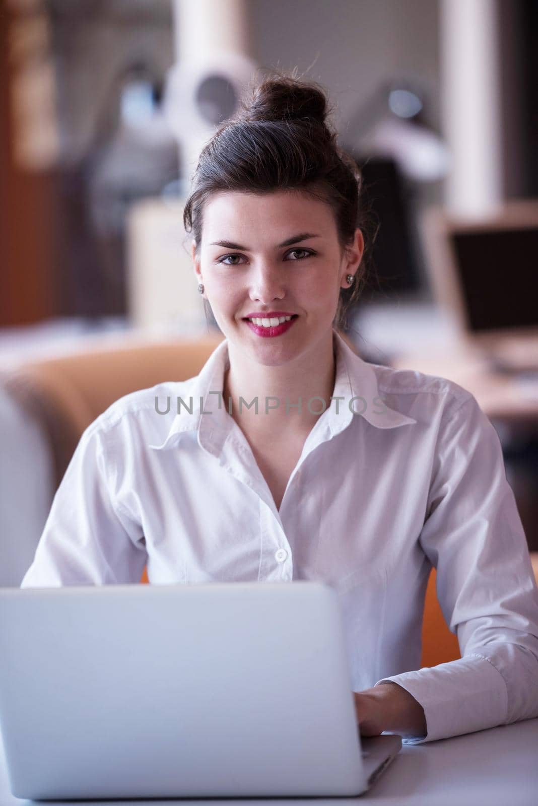 business woman with her staff, people group in background at modern bright office indoors