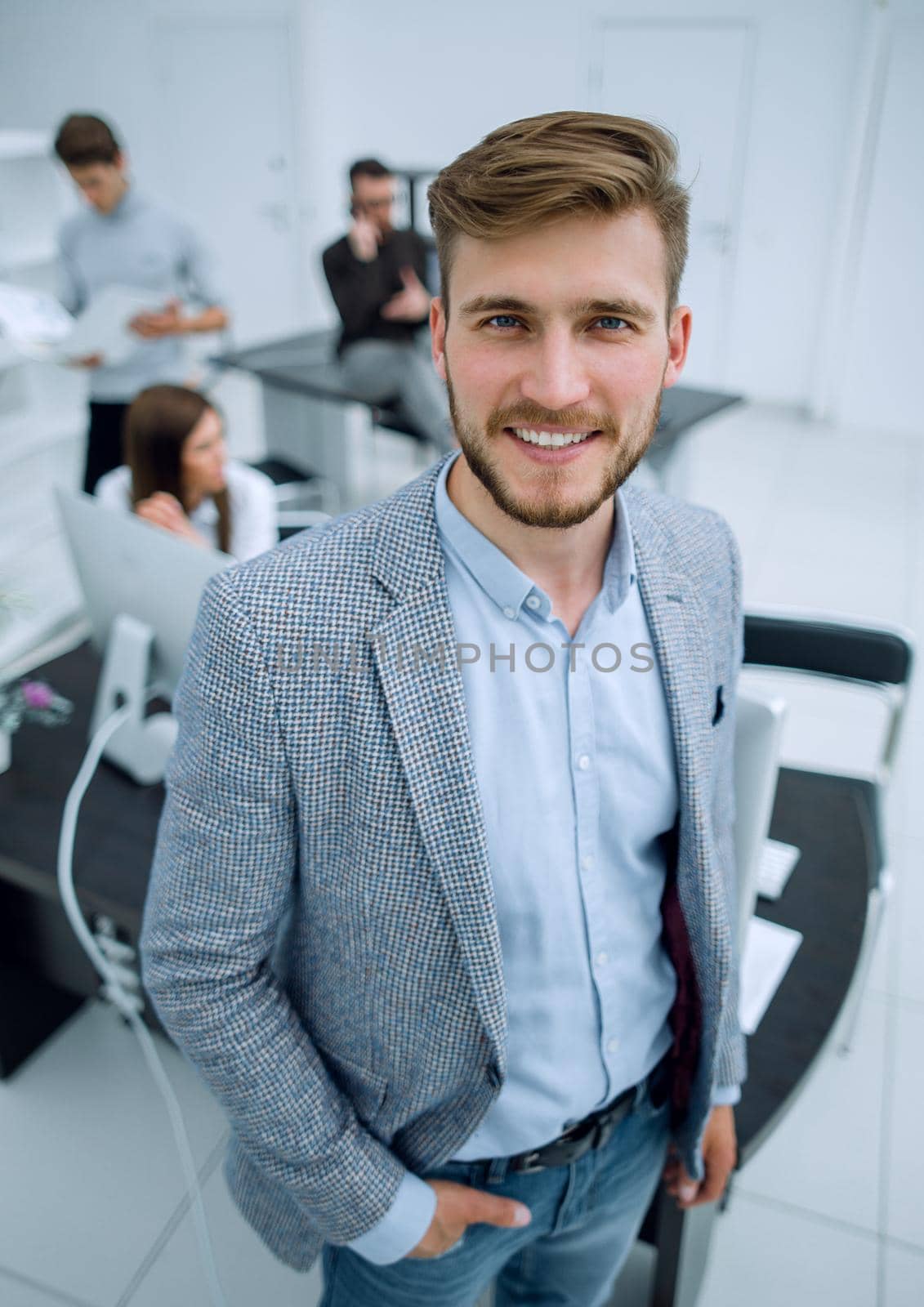 young businessman on the background of the office.business people